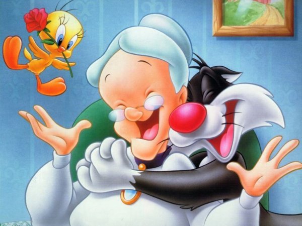 Sylvester and Tweety with very happy granny