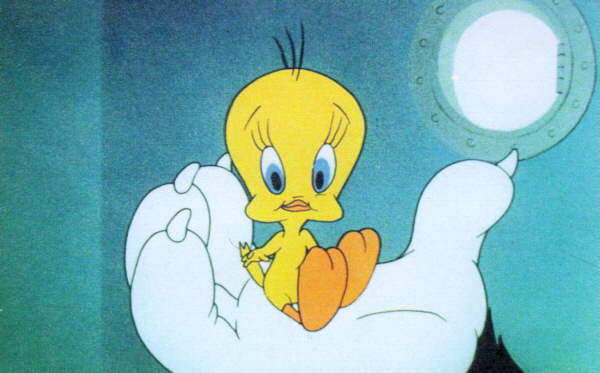 Tiny Tweety in the hand of Sylvester